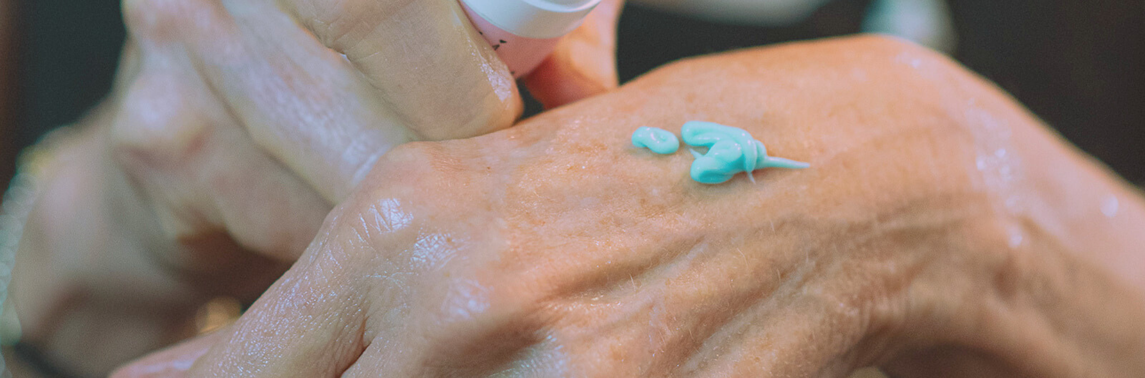 methylene blue mask skincare on a woman's hand